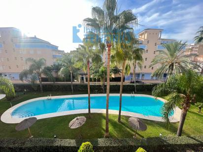 Swimming pool of Apartment for sale in La Antilla  with Air Conditioner, Terrace and Balcony