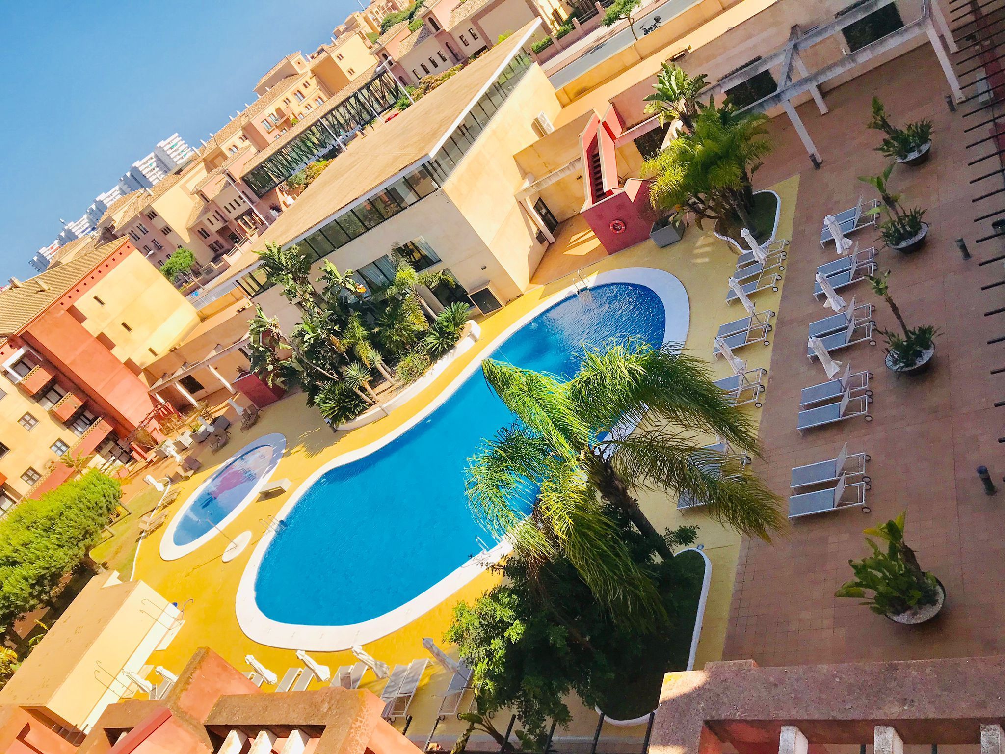 Piscina de Apartament de lloguer en Punta Umbría amb Aire condicionat, Calefacció i Moblat