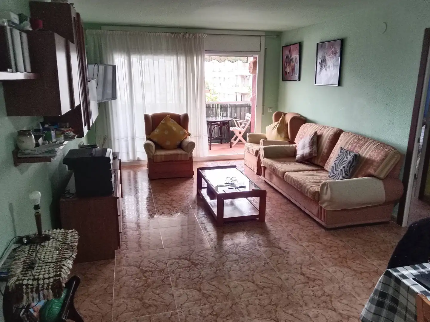Sala de estar de Piso en venta en Calella con Calefacción, Terraza y Amueblado