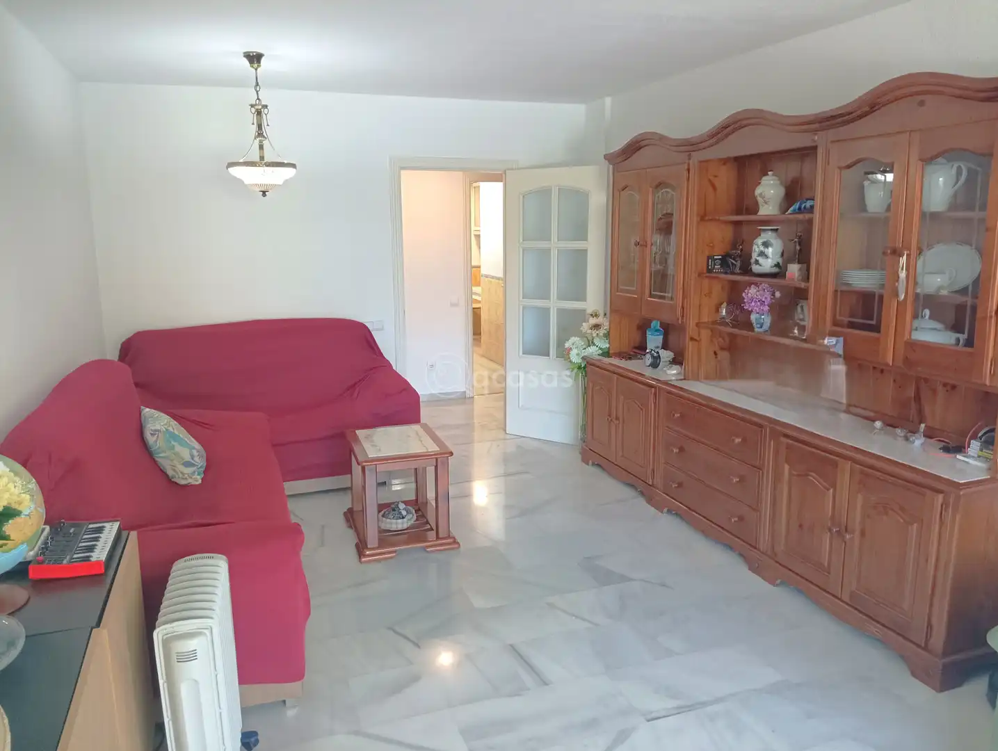 Sala de estar de Piso en venta en Benalmádena con Aire acondicionado, Terraza y Amueblado