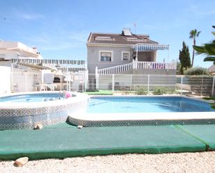 Swimming pool of House or chalet for sale in Torrevieja  with Air Conditioner, Heating and Private garden