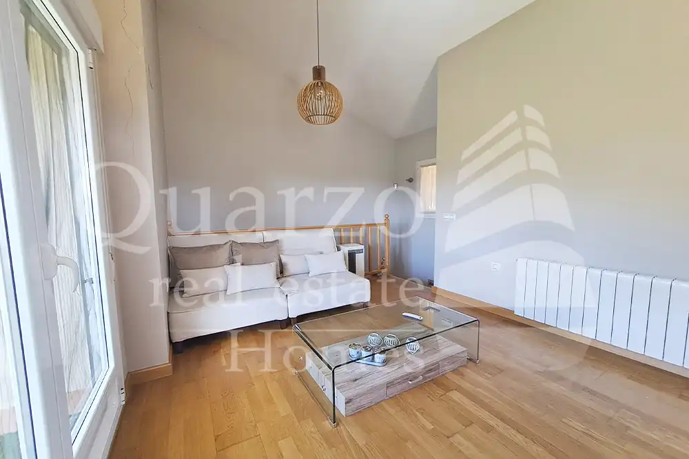 Sala de estar de Casa adosada en venta en Plasencia con Calefacción, Terraza y Balcón