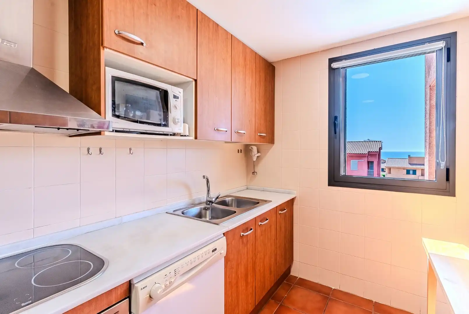 Cocina de Dúplex en venta en L'Ametlla de Mar  con Aire acondicionado, Calefacción y Terraza