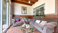 Living room of Single-family semi-detached for sale in Marbella  with Air Conditioner, Terrace and Swimming Pool