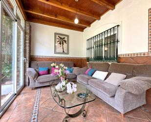 Living room of Single-family semi-detached for sale in Marbella  with Air Conditioner, Private garden and Parquet flooring