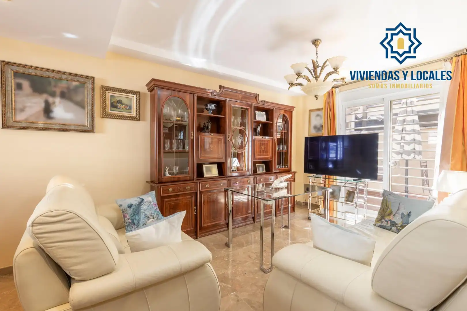 Sala d'estar de Casa adosada en venda en Armilla amb Calefacció