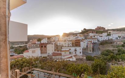 Vista exterior de Casa adosada en venda en Molvízar amb Jardí privat i Terrassa