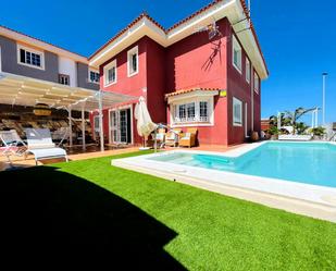 Vista exterior de Casa o xalet en venda en Granadilla de Abona amb Aire condicionat, Jardí privat i Terrassa
