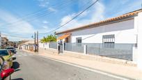 Vista exterior de Casa adosada en venda en Peligros amb Aire condicionat i Jardí privat
