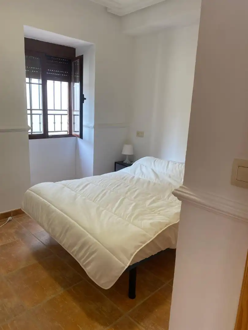 Bedroom of Houses for share in Jaén  with Air Conditioner, Private garden and Terrace
