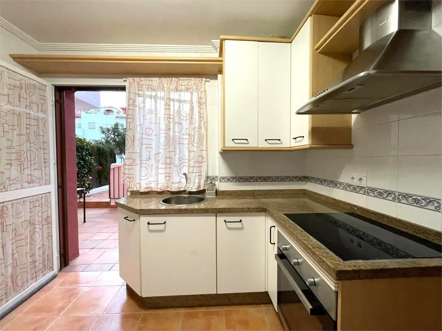 Cocina de Casa o chalet de alquiler en El Portil con Piscina comunitaria