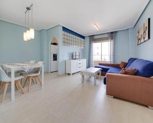 Sala d'estar de Apartament en venda en Torrevieja amb Aire condicionat, Terrassa i Moblat