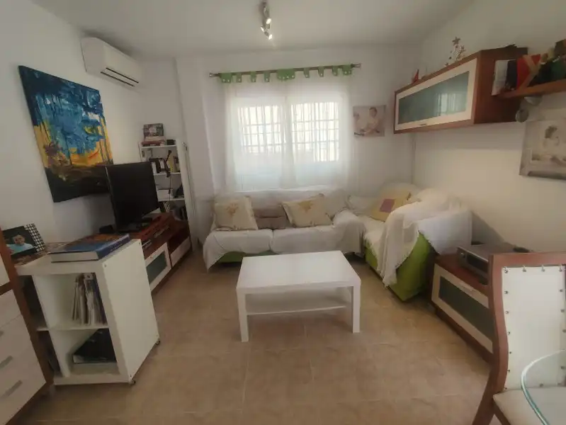 Sala de estar de Casa adosada en venta en Cullera con Aire acondicionado, Calefacción y Terraza