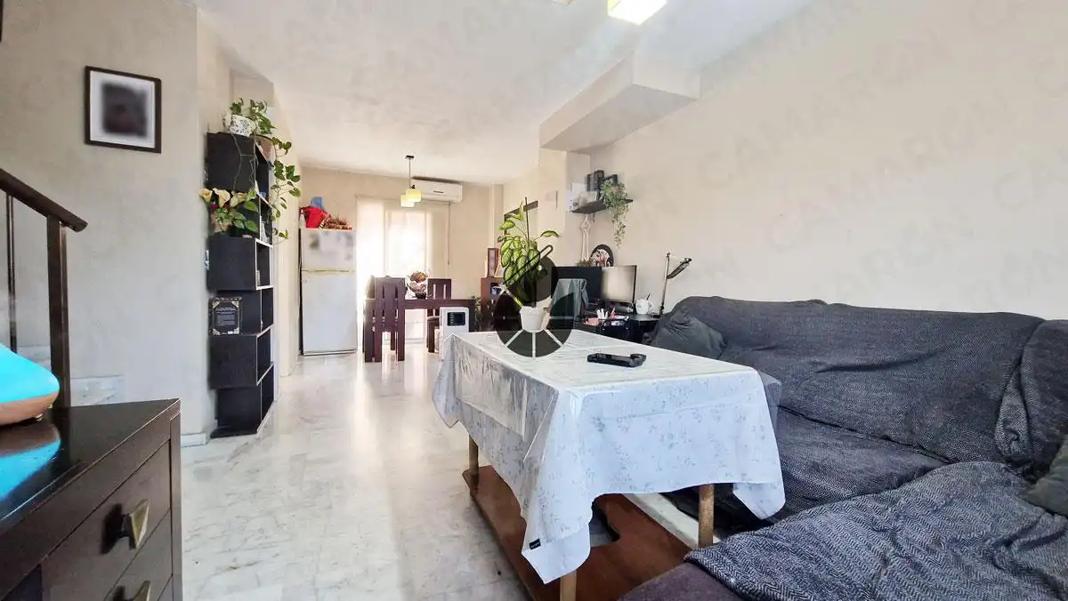 Sala d'estar de Casa adosada en venda en Coria del Río amb Traster i Piscina comunitària