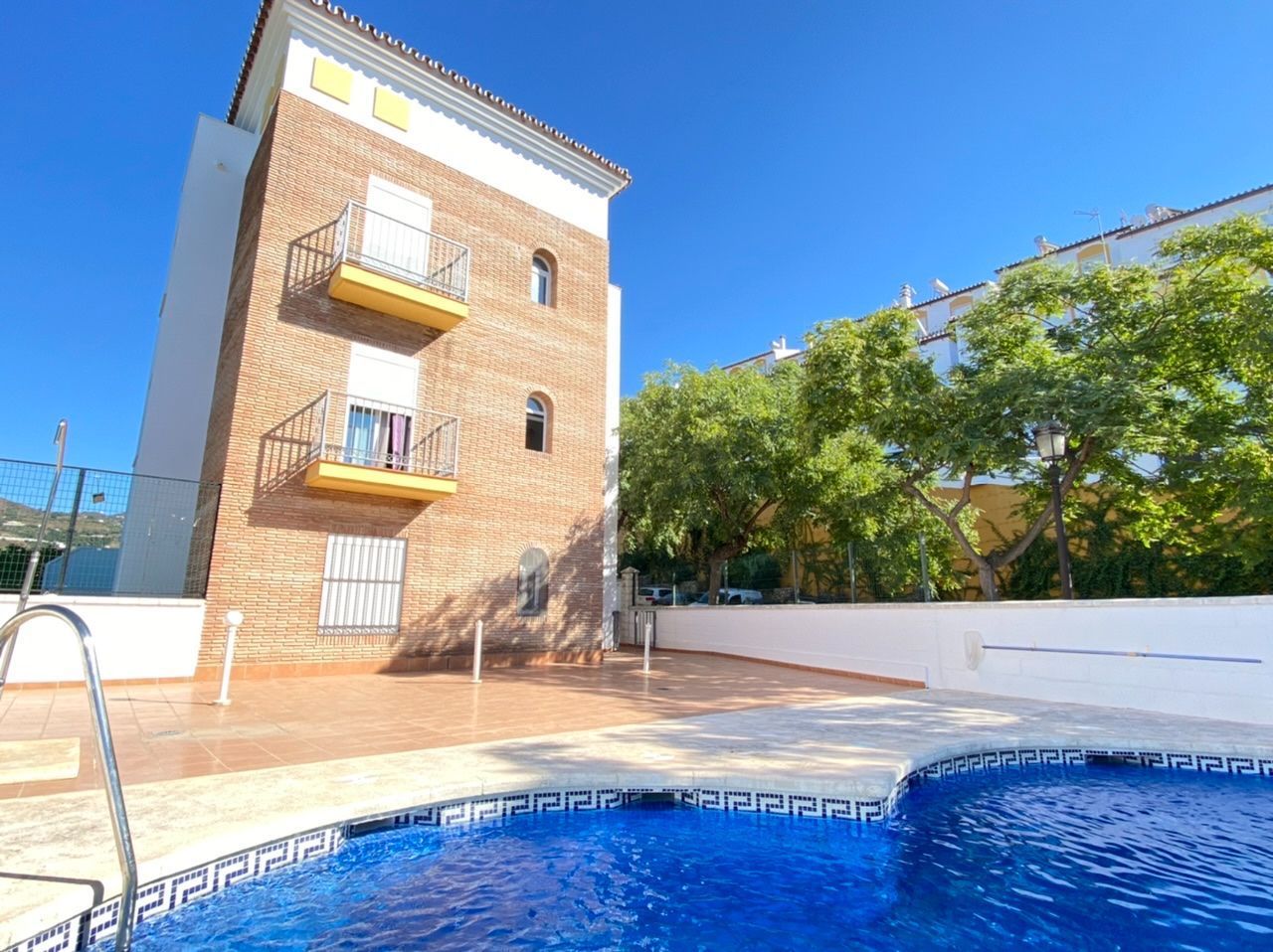 Exterior view of Flat for sale in Torrox  with Air Conditioner, Storage room and Community pool
