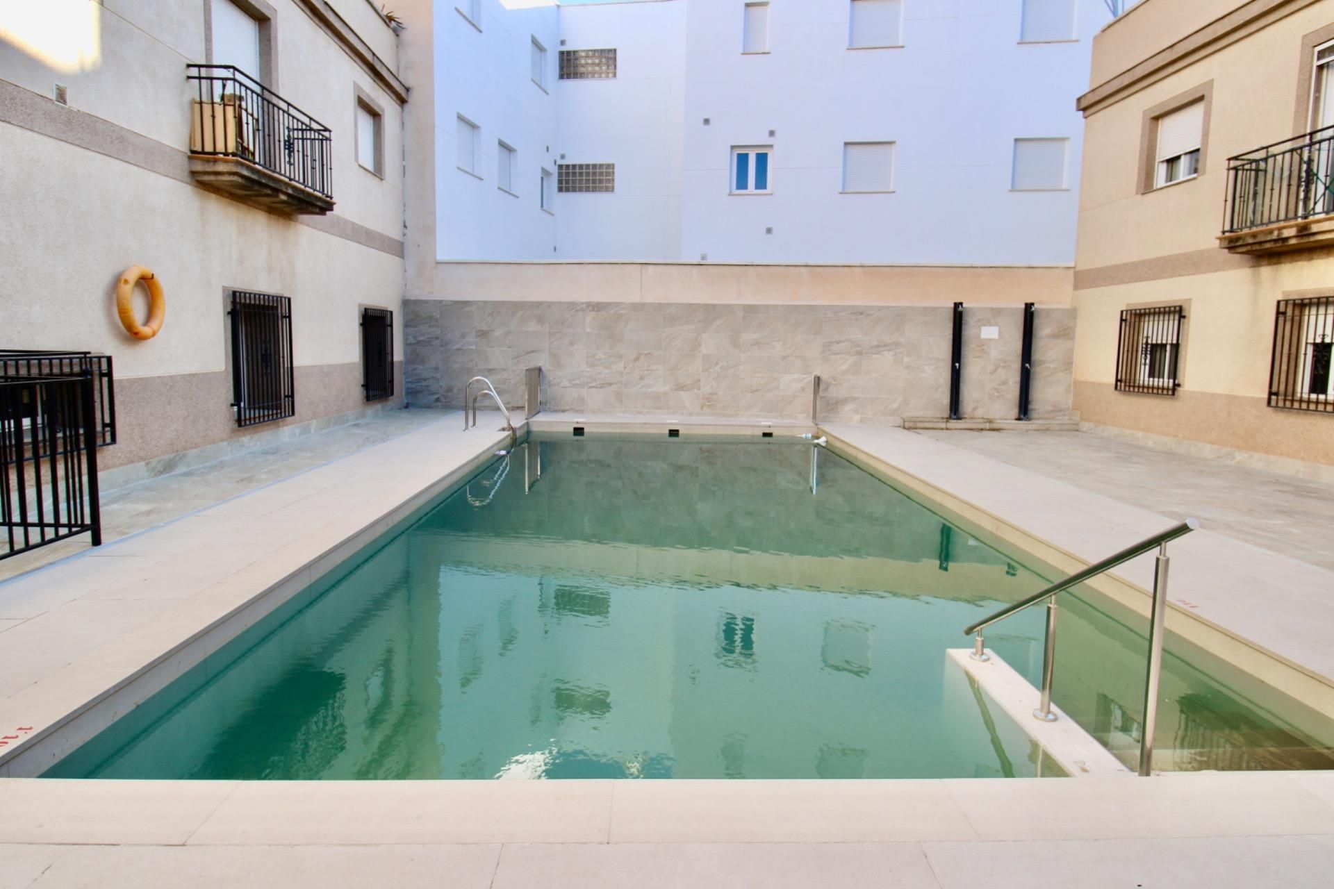 Swimming pool of Flat for sale in Las Gabias  with Air Conditioner, Terrace and Storage room