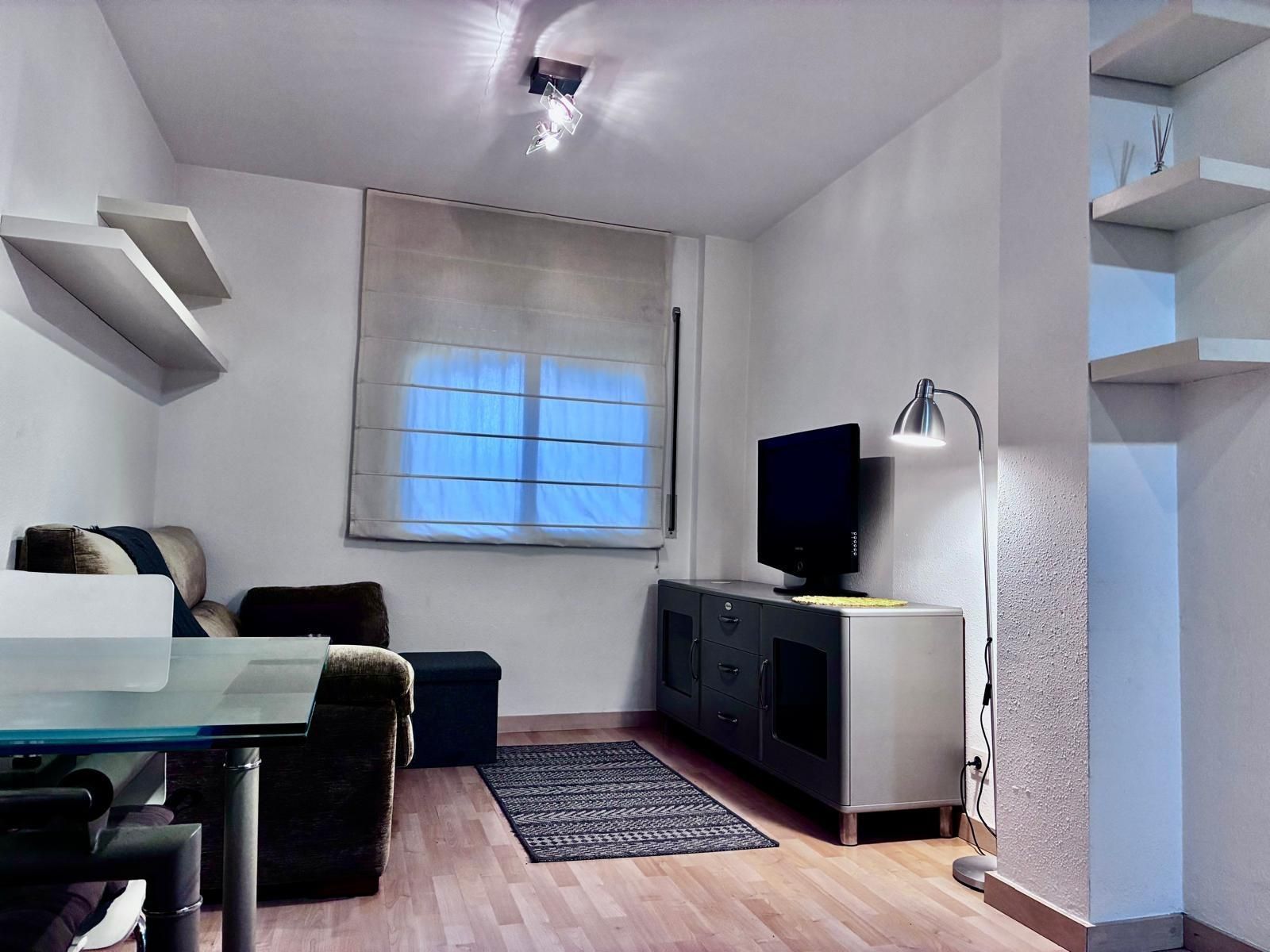 Living room of Planta baja for sale in Pineda de Mar  with Parquet flooring, Terrace and Storage room