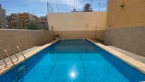 Swimming pool of Flat for sale in Torrevieja  with Air Conditioner, Heating and Terrace