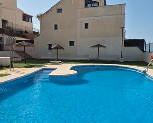Piscina de Casa adosada en venda en Rincón de la Victoria amb Aire condicionat, Jardí privat i Terrassa