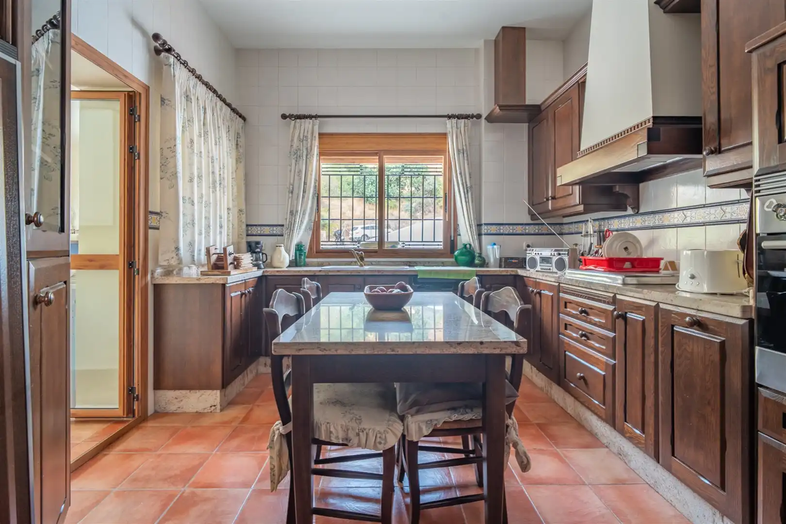 Cuina de Casa o xalet en venda en Málaga amb Terrassa