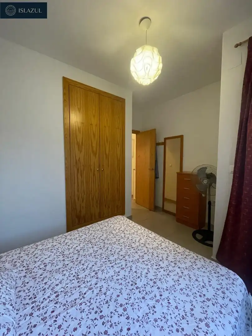 Dormitori de Casa adosada en venda en Isla Cristina amb Jardí privat, Terrassa i Moblat