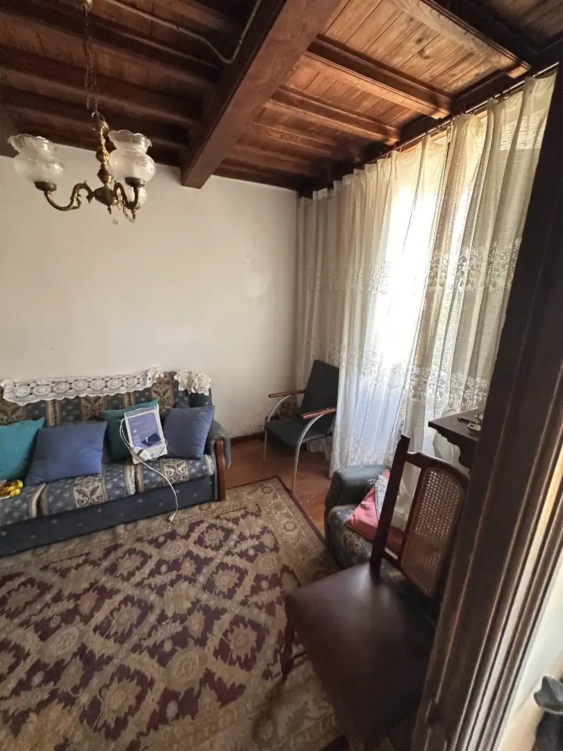 Sala d'estar de Casa adosada en venda en Santiago de Compostela  amb Calefacció, Jardí privat i Terrassa