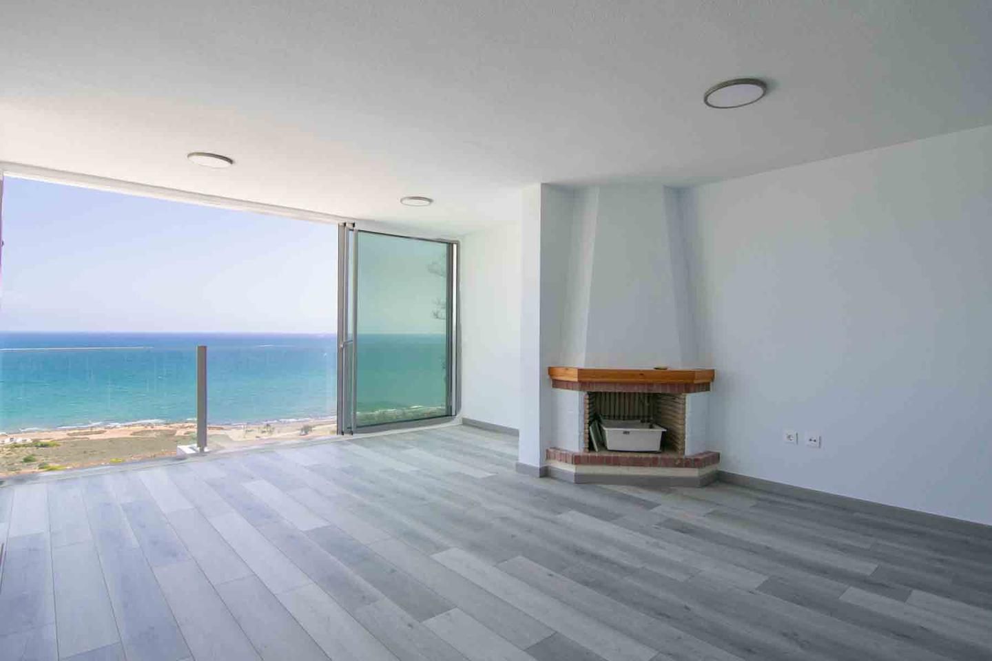 Sala d'estar de Casa o xalet en venda en Santa Pola amb Aire condicionat, Jardí privat i Terrassa