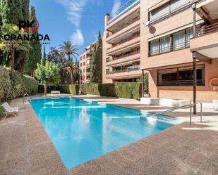 Swimming pool of Flat for sale in  Granada Capital  with Air Conditioner, Heating and Parquet flooring