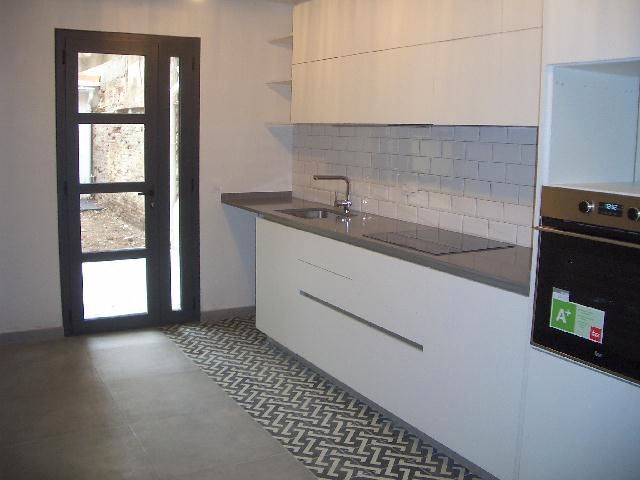 Kitchen of Planta baja to rent in  Barcelona Capital  with Air Conditioner, Private garden and Storage room