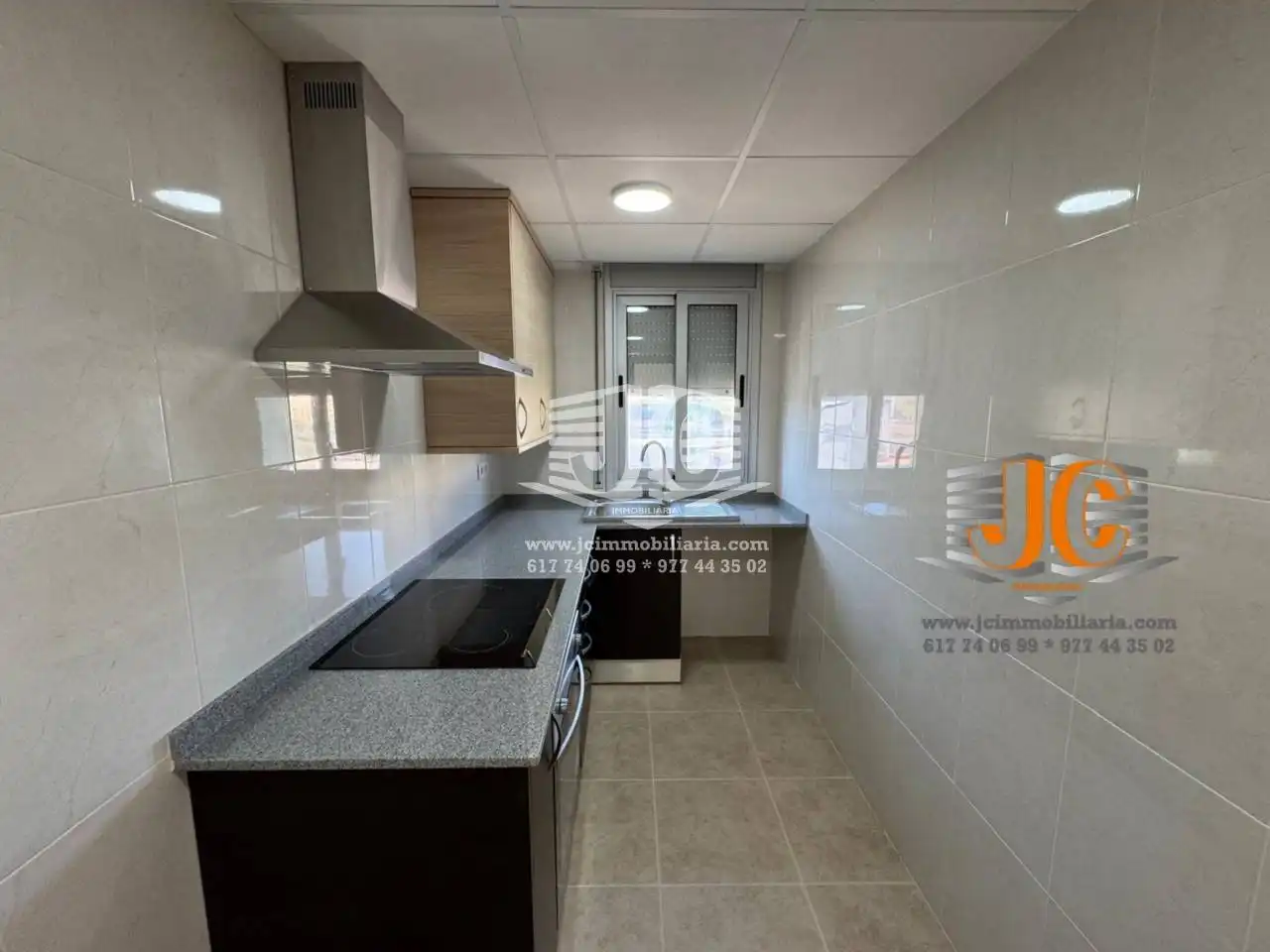 Kitchen of Flat for rent in L'Aldea  with Balcony and Alarm