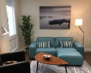 Sala d'estar de Apartament de lloguer en  Madrid Capital amb Aire condicionat i Moblat