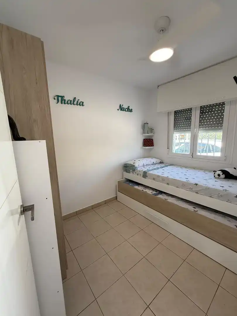 Dormitori de Apartament de lloguer en El Verger amb Aire condicionat, Jardí privat i Piscina