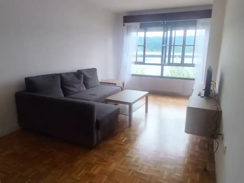 Sala d'estar de Pis de lloguer en Muros de Nalón amb Calefacció, Moblat i Forn