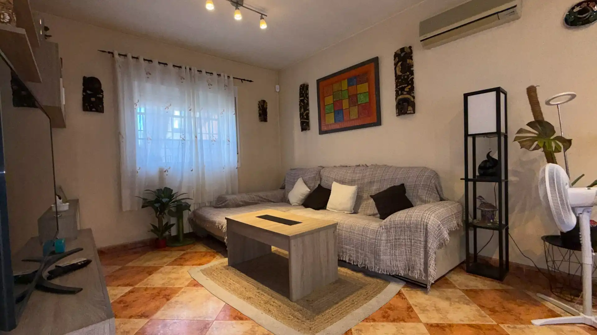 Sala de estar de Casa adosada en venta en Villa del Prado con Aire acondicionado y Terraza