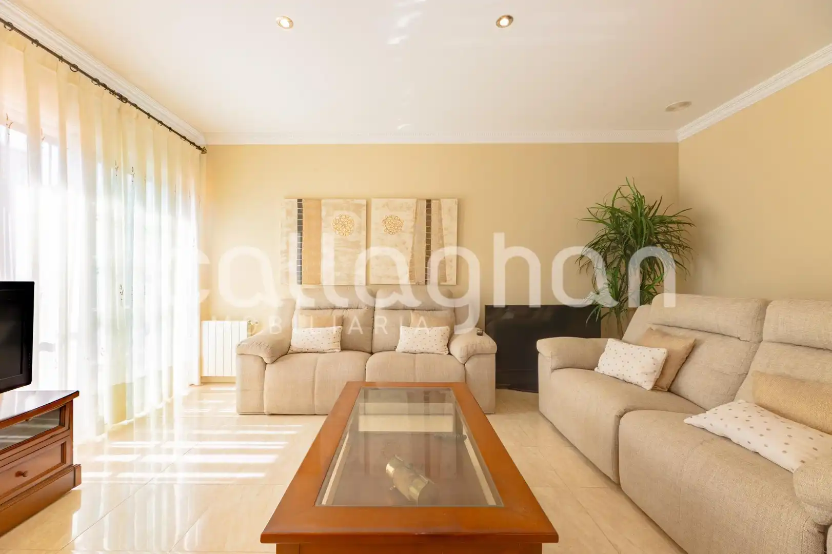 Sala d'estar de Casa o xalet en venda en Sagunto / Sagunt amb Calefacció, Jardí privat i Terrassa