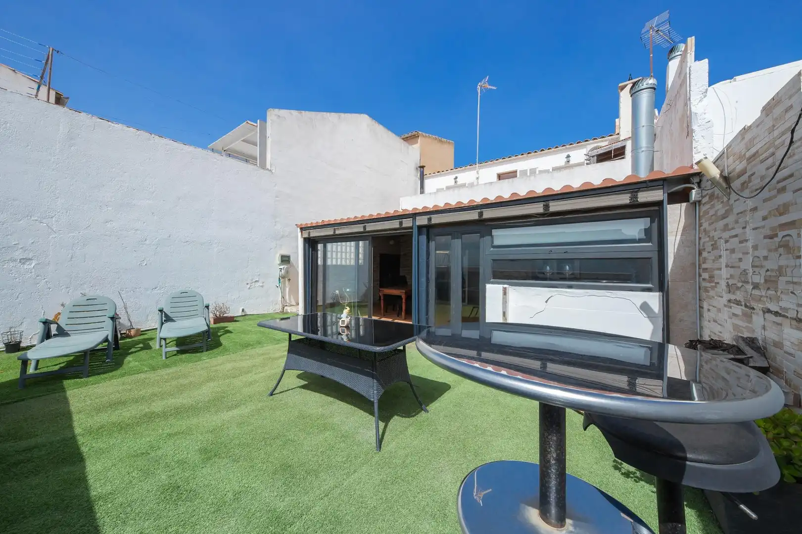 Terrasse von Einfamilien-Reihenhaus zur Miete in Campos mit Klimaanlage, Heizung und Parkett
