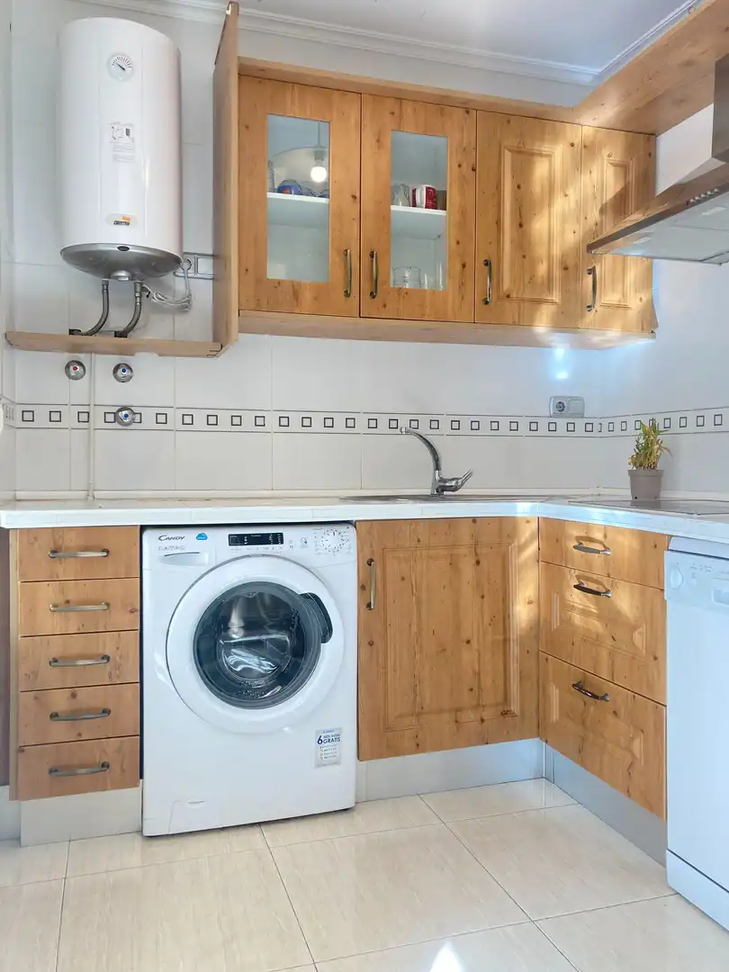 Kitchen of Flat for sale in Roquetas de Mar  with Air Conditioner, Terrace and Swimming Pool
