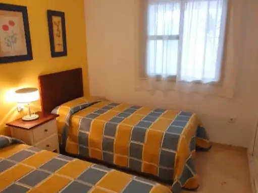 Habitación de Apartamento de alquiler en Chipiona con Aire acondicionado, Calefacción y Jardín privado