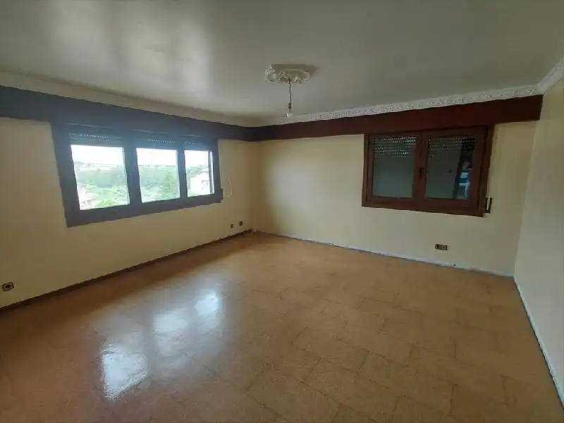 Sala d'estar de Casa o xalet en venda en Arteixo amb Jardí privat i Alarma