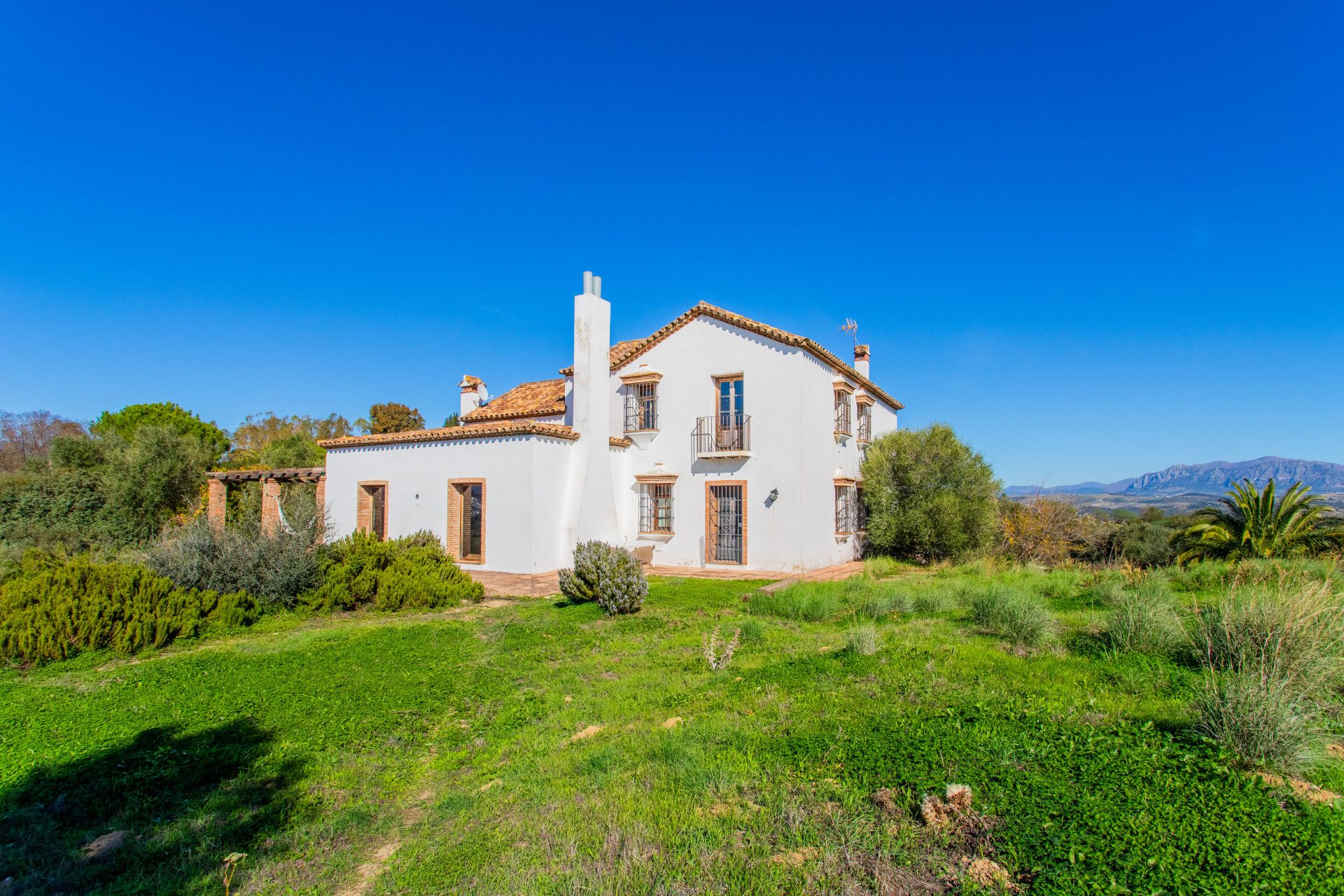 Vista exterior de Casa o xalet en venda en Jimena de la Frontera amb Aire condicionat, Calefacció i Jardí privat
