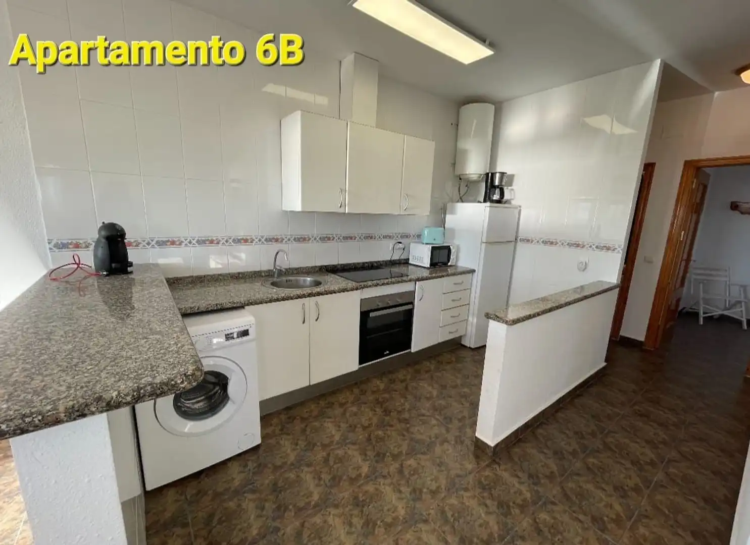 Küche von Wohnung zum Verkauf in Alcalà de Xivert mit Privatgarten, Terrasse und Gemeinschaftspool