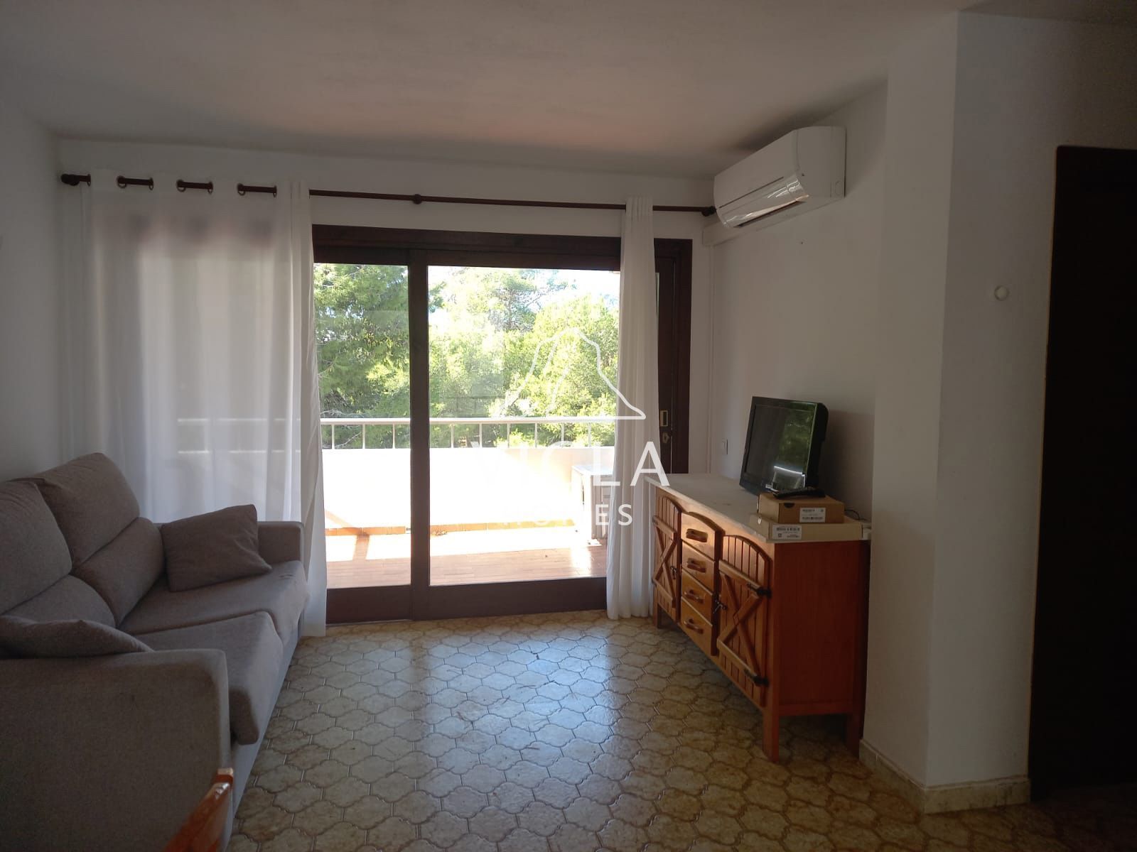 Sala de estar de Apartamento de alquiler en Sant Joan de Labritja con Aire acondicionado, Calefacción y Terraza