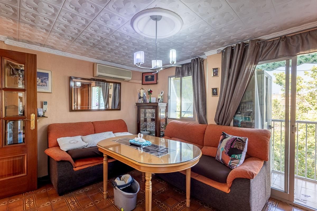 Sala de estar de Piso en venta en  Granada Capital con Aire acondicionado