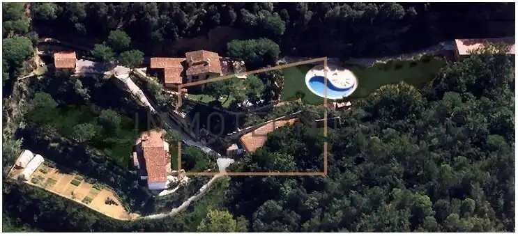 Vista exterior de Finca rústica en venda en Sant Iscle de Vallalta amb Calefacció, Jardí privat i Piscina