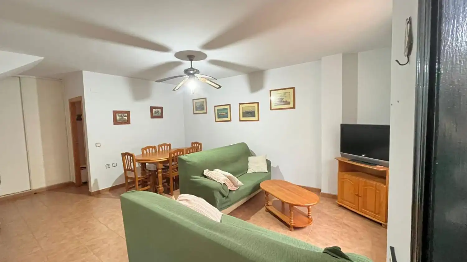 Sala de estar de Casa adosada en venta en Islantilla con Terraza y Piscina comunitaria