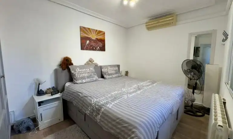Dormitori de Casa adosada en venda en Orihuela amb Aire condicionat, Jardí privat i Terrassa