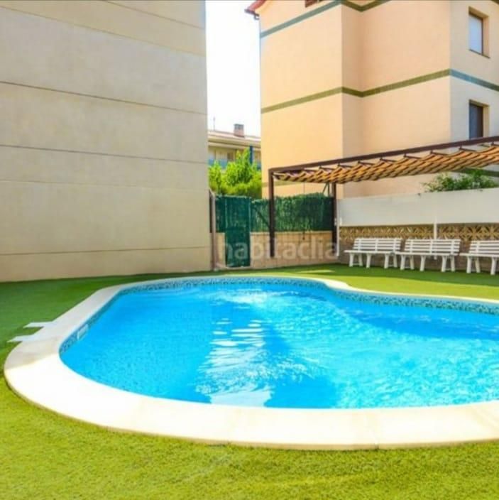 Swimming pool of Apartment for sale in Roda de Berà  with Air Conditioner, Heating and Furnished