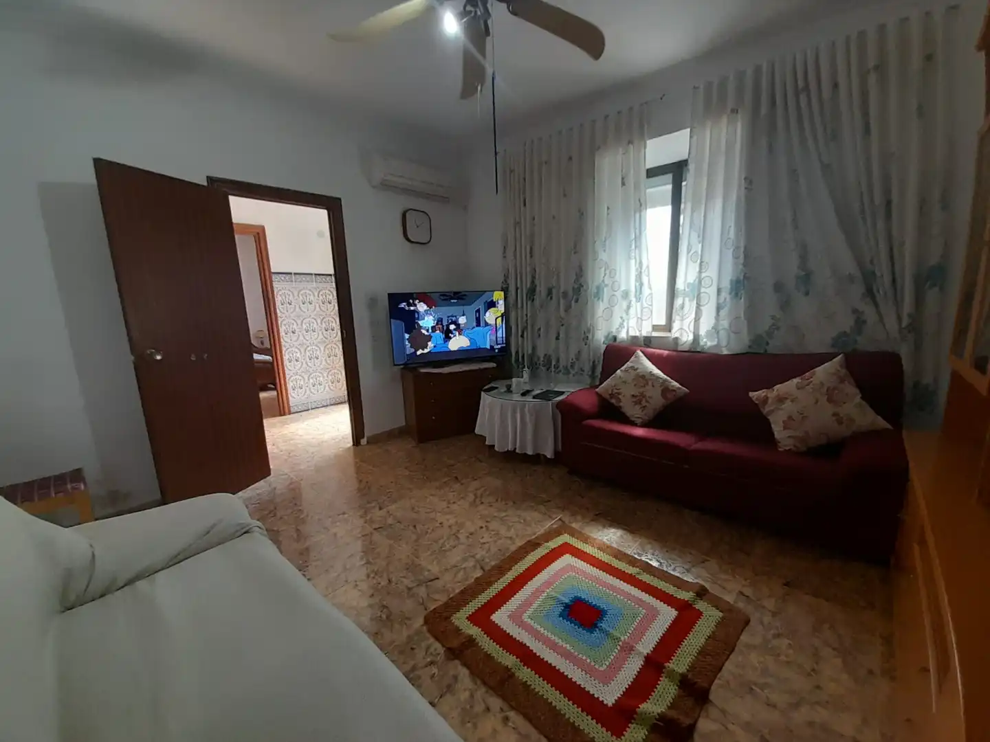Sala d'estar de Casa adosada en venda en Puertollano amb Aire condicionat i Traster