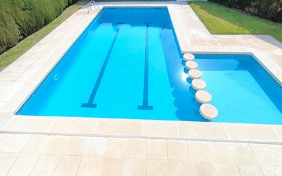 Swimming pool of Single-family semi-detached for sale in Cambrils  with Air Conditioner, Heating and Parquet flooring