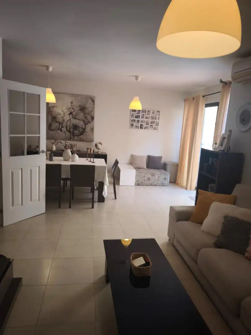 Sala de estar de Casa adosada en venta en Melilla con Aire acondicionado, Jardín privado y Terraza